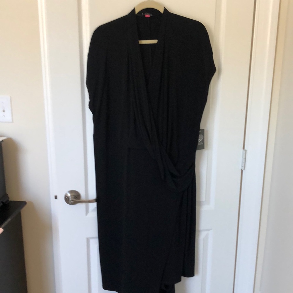 Black drape dress. Knee length. Very flattering on any body type/size